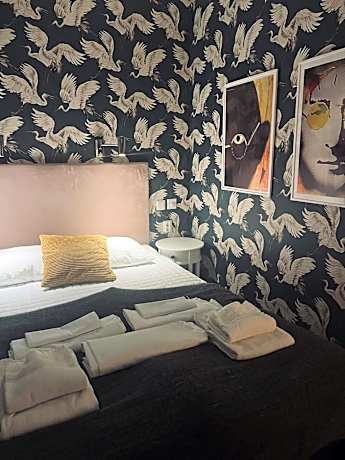 Queen Room with Shared Bathroom (No Windows)