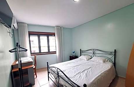 Queen Room with Shared Bathroom