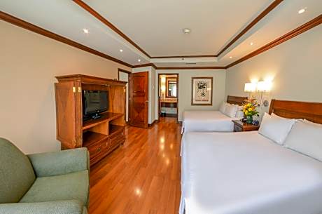 Master Suite with Two Queen Beds and Sofa Bed