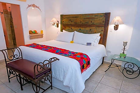 Suite with King Size Bed and Pool view at Main Building