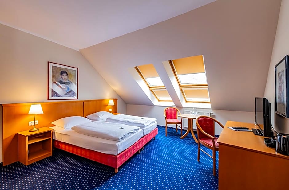 Photo 1 of 8 of Triple Room