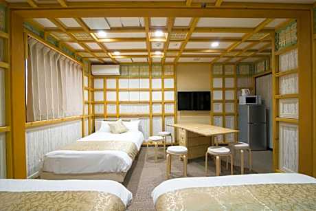 Standard Triple Room (Two Double Beds + One Small Double Bed)