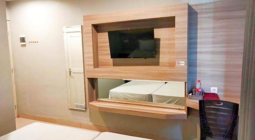 Wikost Premiere Inn mitra RedDoorz