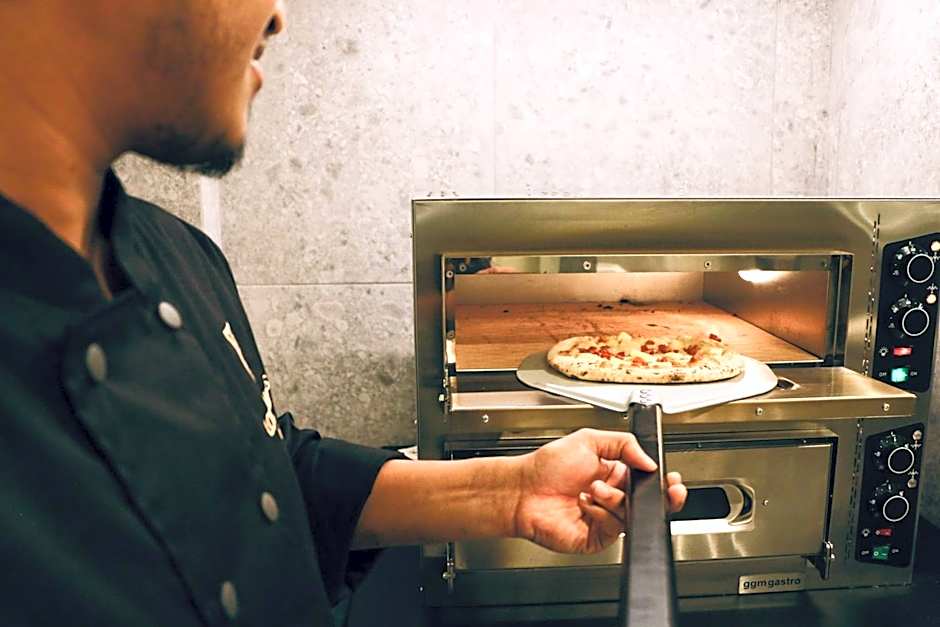 Gspot Hostels & Love Triangles Pizzeria