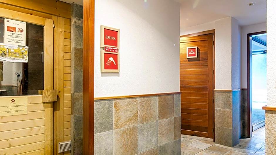 Vacancéole - Résidence Les Chalets de la Ramoure