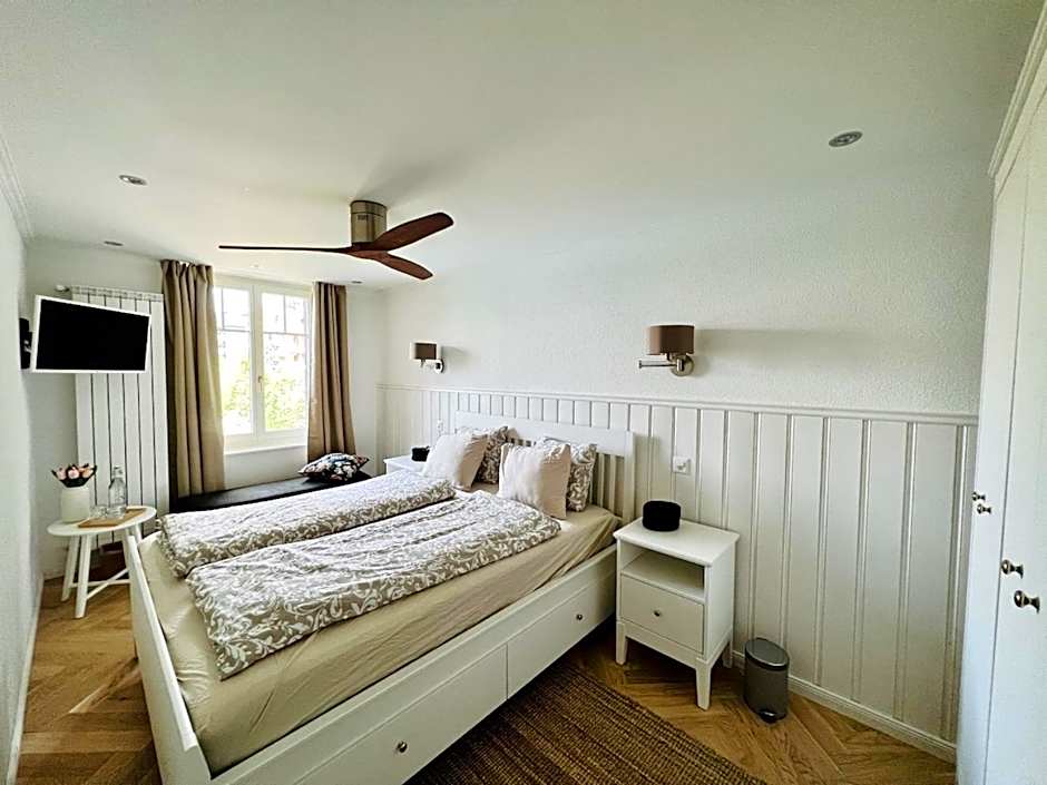 Boutique Hotel Niesenblick - direkt am Thunersee gelegen mit SELF CHECK IN & digitaler Rezeption