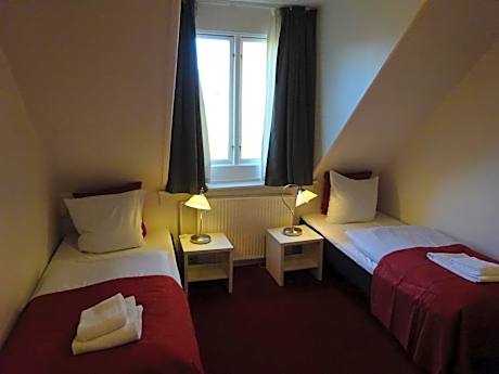 Economy Triple Room with Shared Bathroom