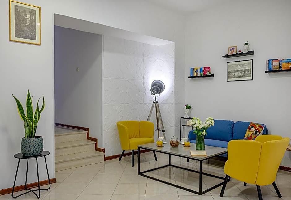 Yellow house with private parking