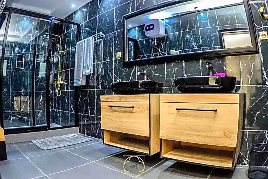 AMJ HOTEL