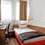 Orange Hotel und Apartments