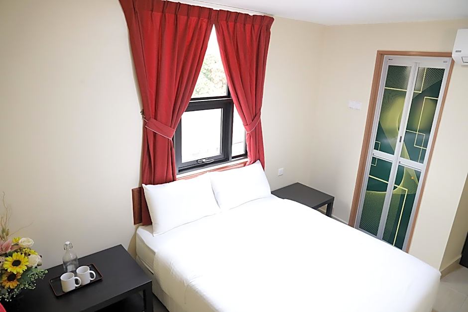 Capital O 90897 Island City Hotel