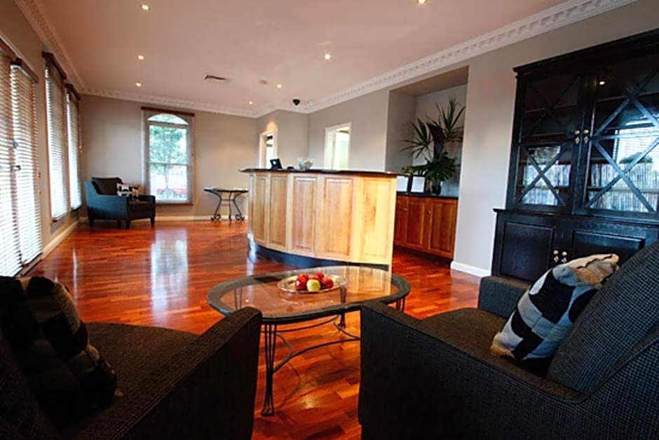 Carlyle Suites & Apartments