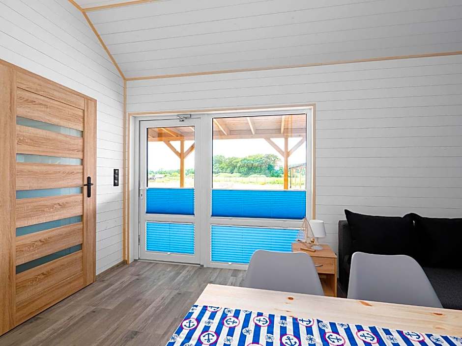 Zakatek Baltyku - domki nad morzem i jeziorem