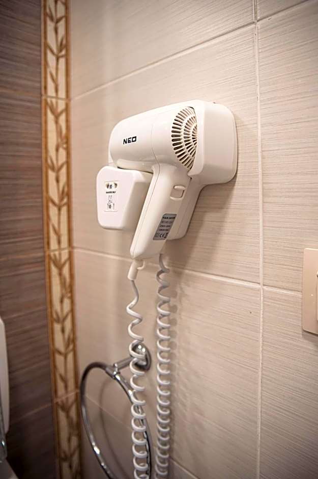 Three Dolphins Hotel with a Rooftop terracе