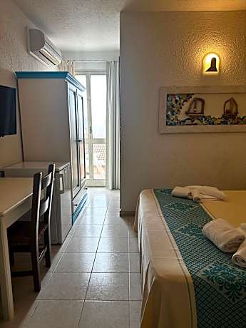 Quadruple Room with Balcony
