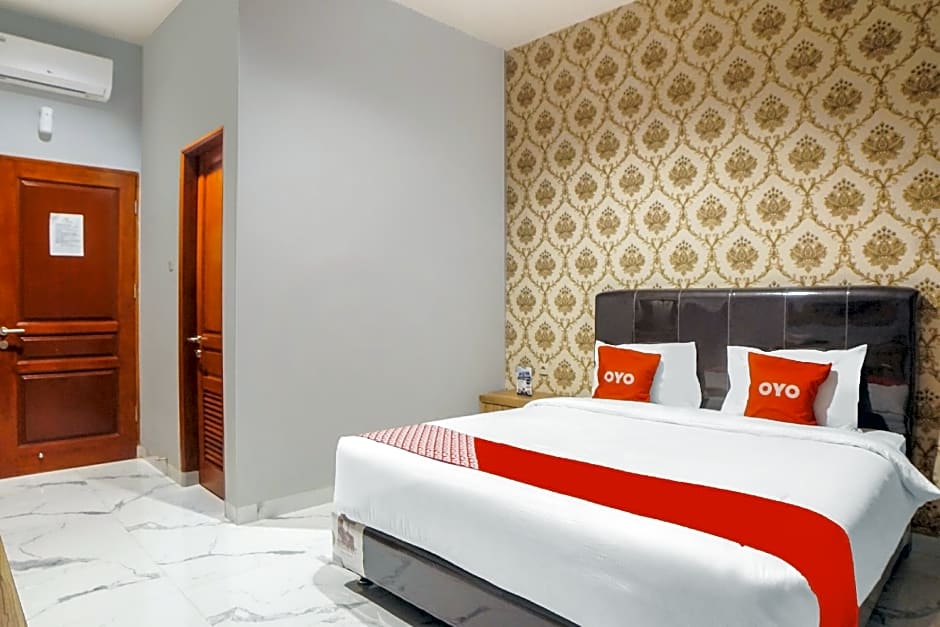 SUPER OYO Capital O 92066 Papakoel Hotel & Cafe