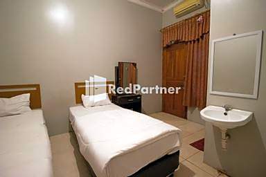 De Kost Solo Mitra RedDoorz