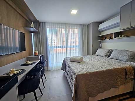 Studio com Piscina no Rooftop a 50m da praia