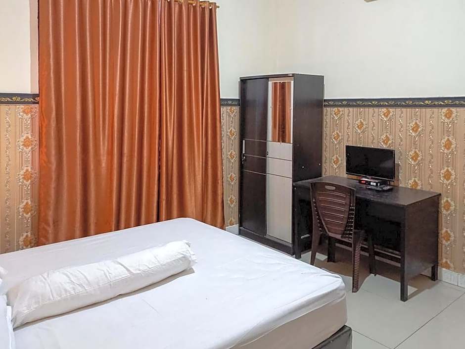 Homestay Singgasana Mitra RedDoorz