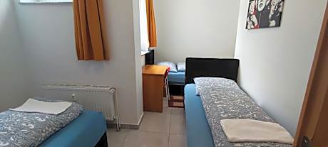 Economy Quadruple Room with Shared Bathroom