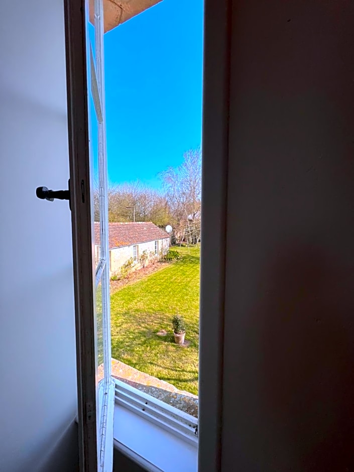 Les chambres d'Omaha Beach Etablissement avec deux chambres d'hôtes, petit-déjeuner compris fait-maison et produits locaux
