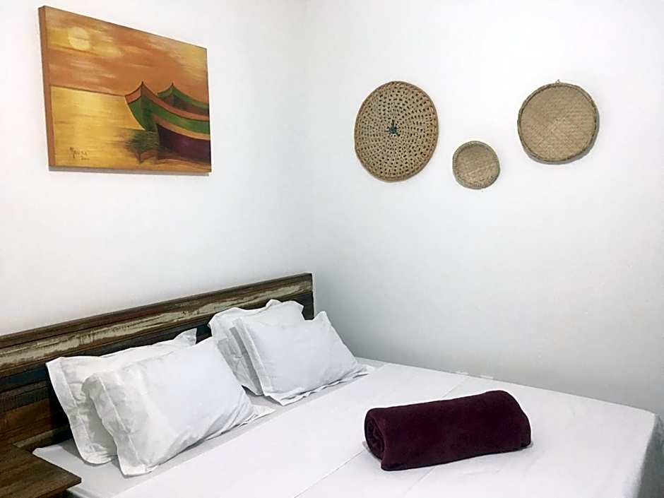 Suites Mar e Lua em casa compartilhada