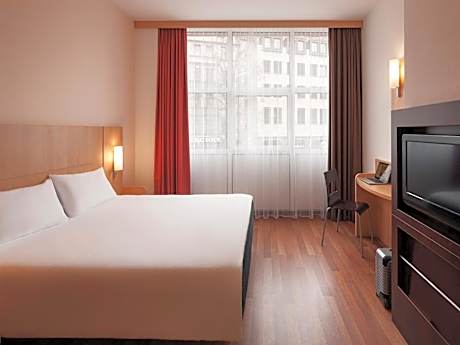 Room with One Double and One Single Bed