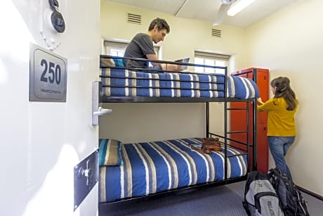 Small Twin Room with Shared Bathroom - Prison Cell