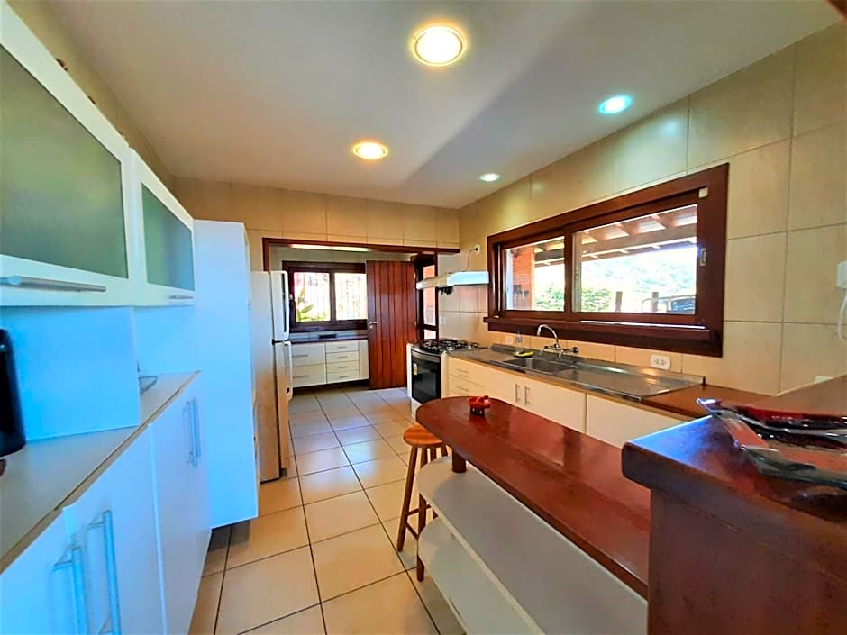 3Suítes, piscina e vista do mar em condomínio pé na areia - pátio compartilhado