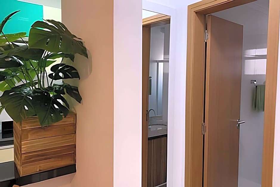 Apartamentos aconchegantes frente mar