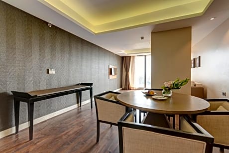 King Suite with City View and 20% disc on Food & Soft Beverage, 15% disc on laundry, Unlimited IMFL drinks (House Brand) & finger food (Chef Choice), Choice of Cocktail/Mocktails between 1730 hrs to 1930 hrs at an additional charge of INR 1299+GST/person