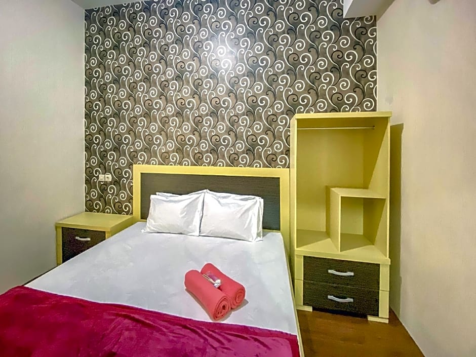 Tini's Guest House Malang Mitra RedDoorz