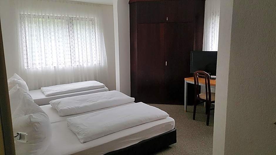 Photo 1 of 2 of Triple Room