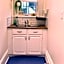 Pet-Friendly Space #3 at Doggy Digs, King Bed and Office