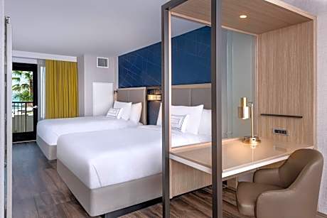 Queen Suite with Two Queen Beds, Ocean View, Trundle Sofa and Balcony