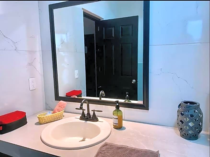 Master Bedroom with Private Bathroom and Work Area