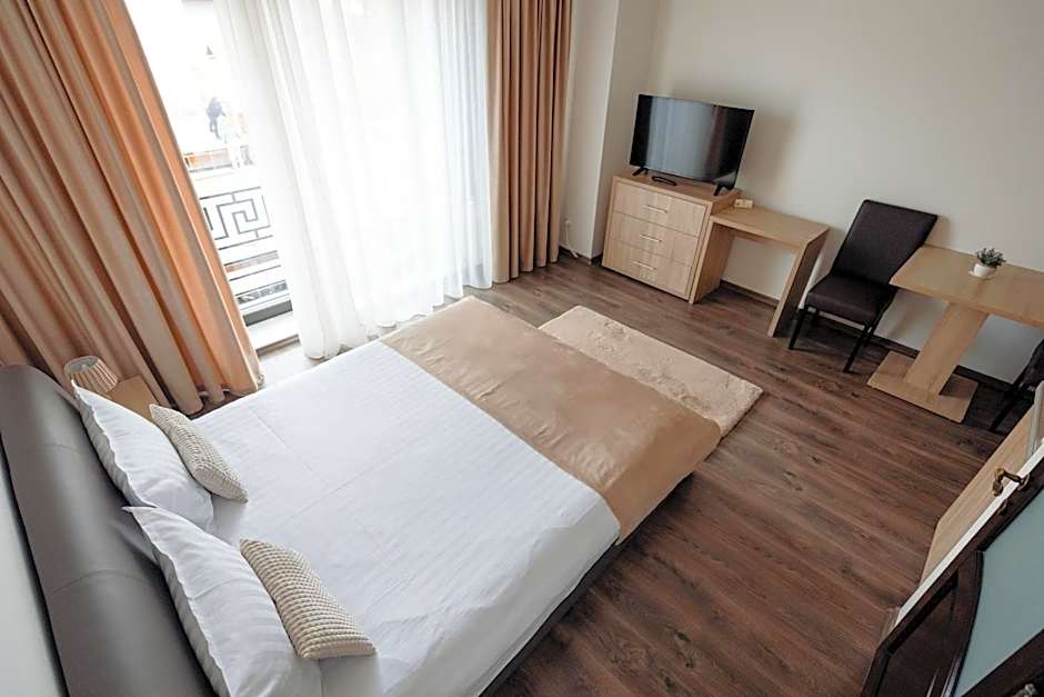 Aparthotel Punct pe i