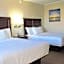 Magnuson Grand Pioneer Inn And Suites