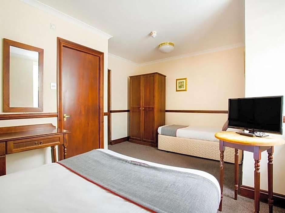 Photo 1 of 7 of Deluxe Triple Room