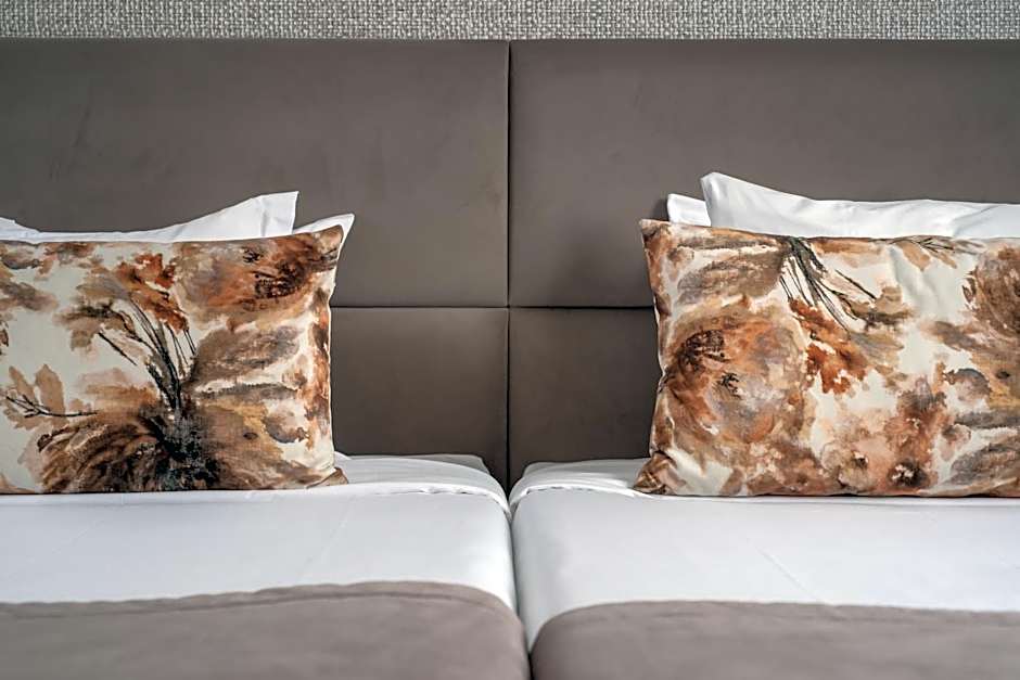 Essence Inn Marianos Hotel