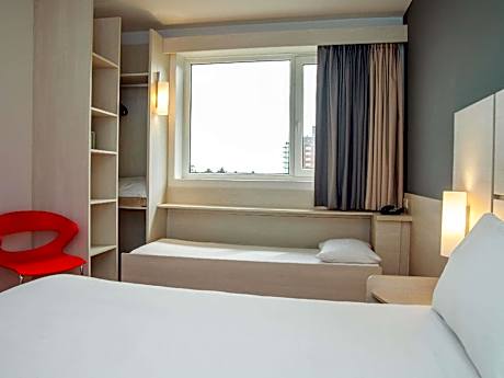 Standard Room with twin beds and one child's bed