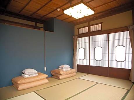 Quadruple Room with Shared Bathroom