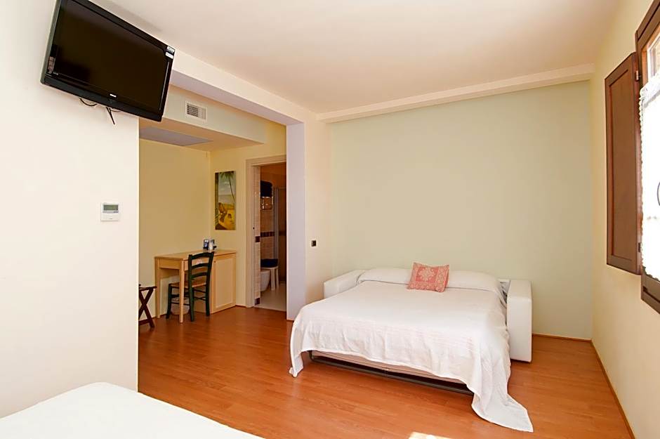 Foto 1 de 7 de Quadruple Room