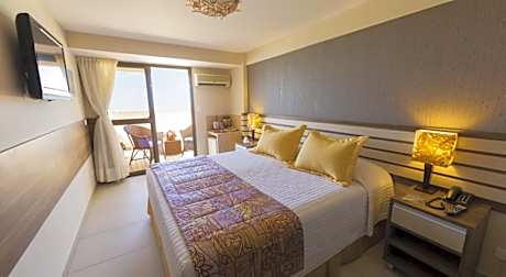 TRIPLE LUXO VISTA LATERAL MAR