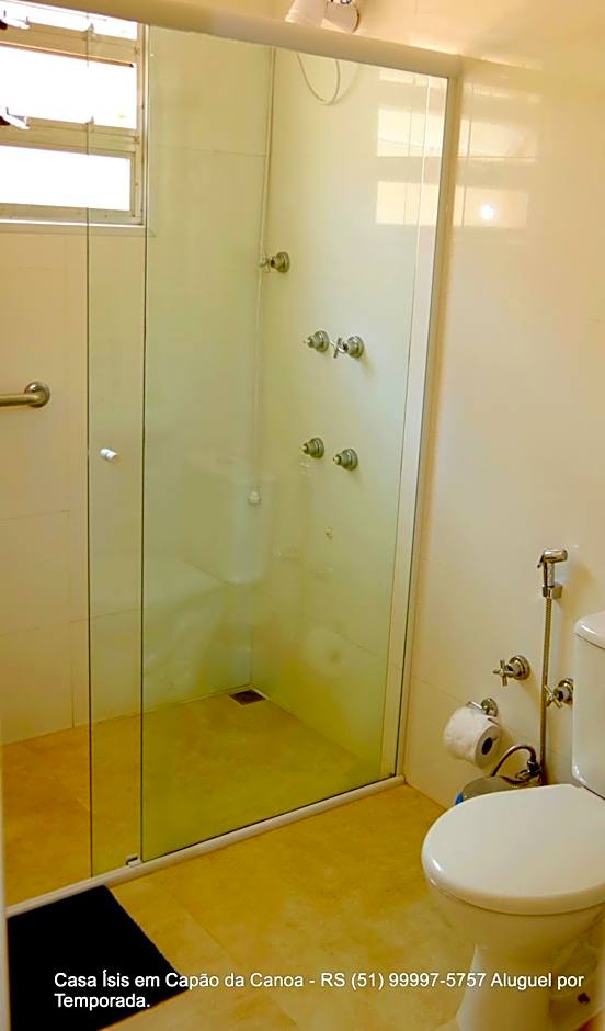 Casa ÍSIS de aluguel por temporada em Capão da Canoa com piscina