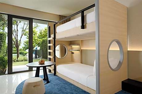Family Room with One King Bed, One Bunk Bed and Garden View
