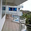 Cowrie Shell Beach Apartments Official