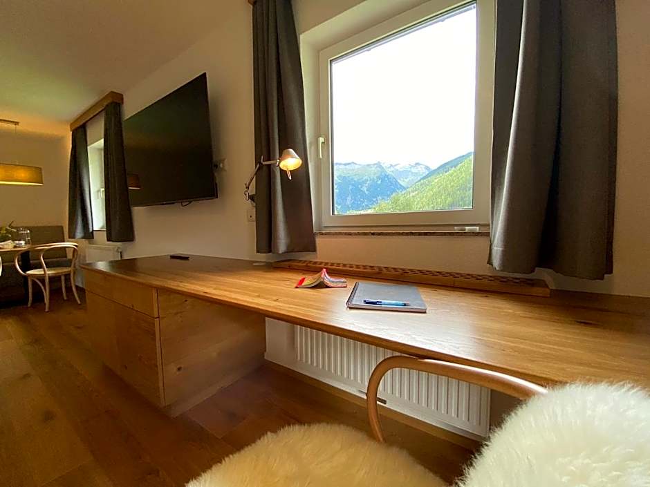 Apartments Hohenberger Mallnitz - Tauernbad und Sauna im Winter inklusive!