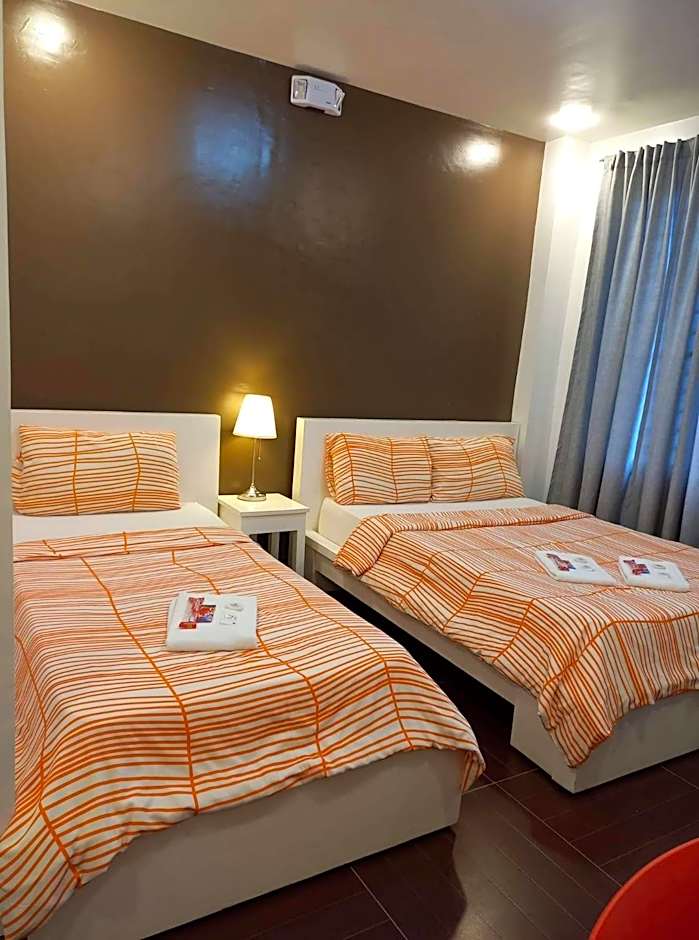 Foto 1 daripada 11 — Triple Room with Private Bathroom