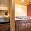 Industry Inn & Suites